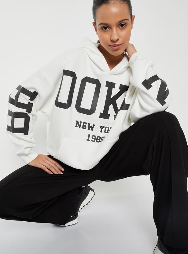 Buy Women Printed Oversized Sports Sweatshirt Online at just Rs