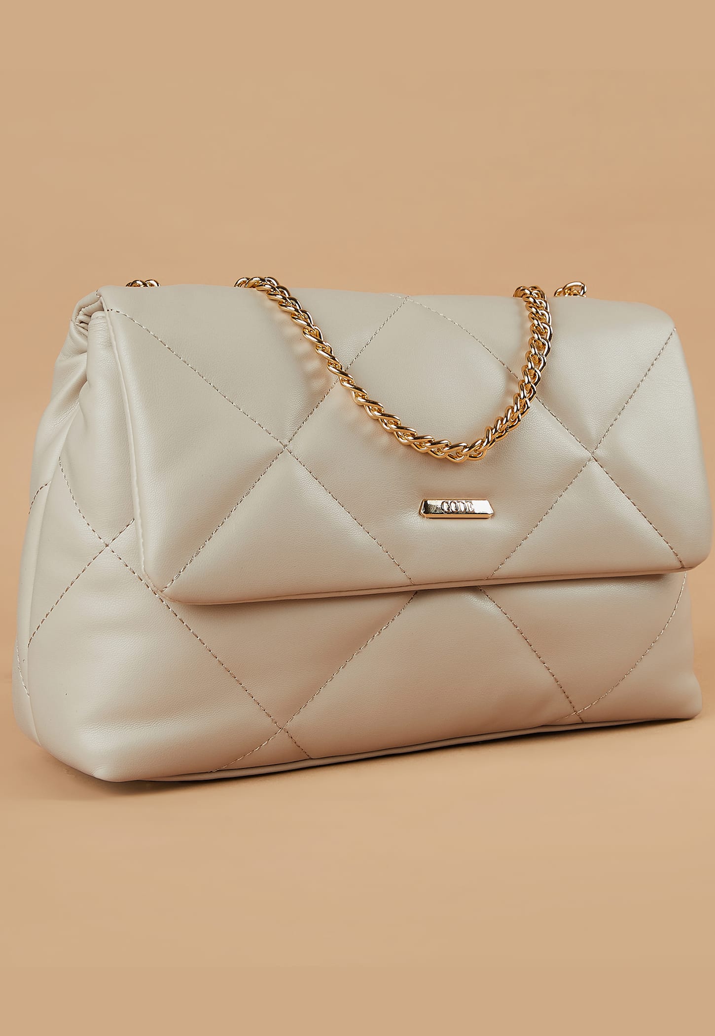 code quilted sling bag