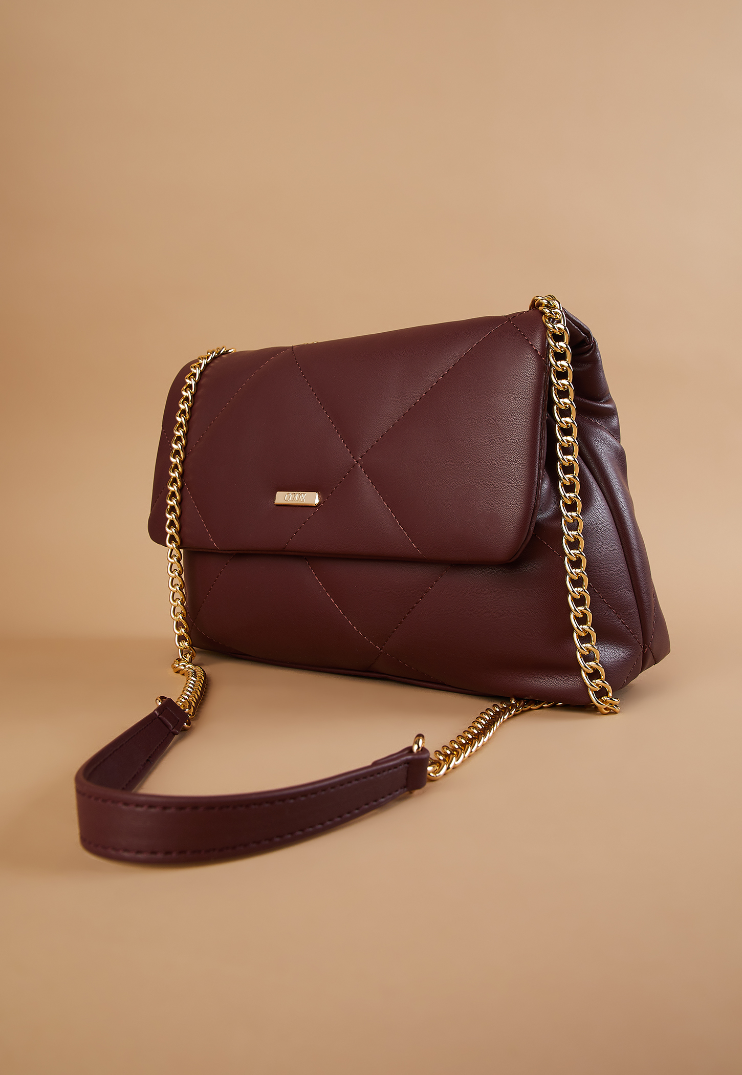 code quilted sling bag